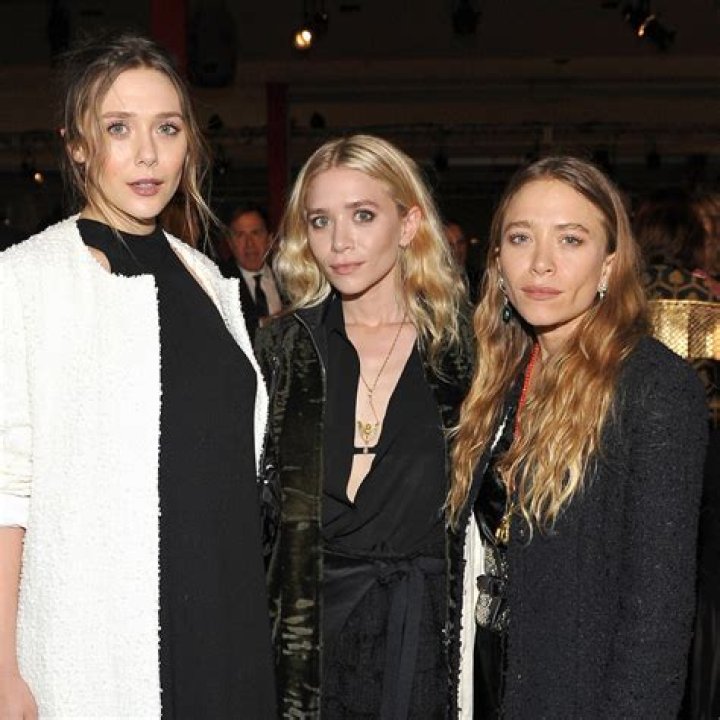 Ashley, Mary-Kate, & Elizabeth Olsen Spotted on Rare Sisters’ Night Out in NYC