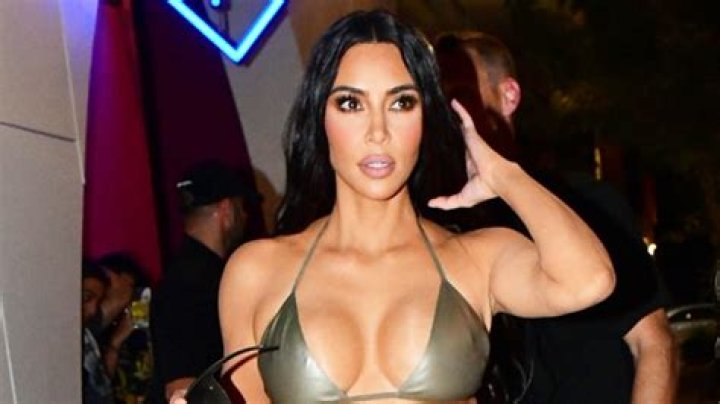Kim Kardashian Takes A Dip In Strapless Silver Bikini As She Enjoys A Throwback ‘Lazy Sunday’: Photo