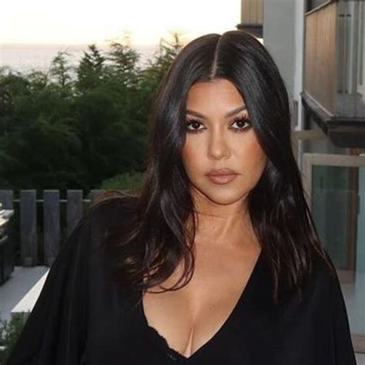 Kourtney Kardashian Flashes Nipple & Cleavage In Lacy Top For Kanye’s Concert — Pics