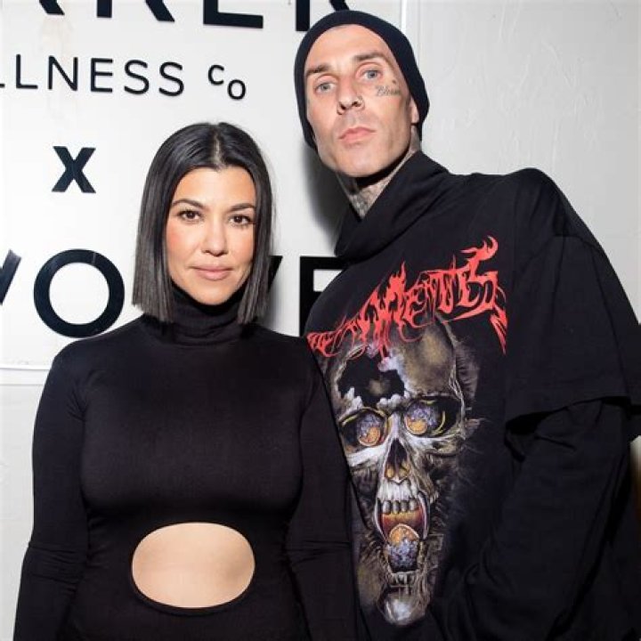 Kourtney Kardashian Wraps Her Arms Around Travis Barker In 1st Serious PDA Pics